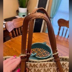 Purse in great condition except small Wear of leather strap .best offer